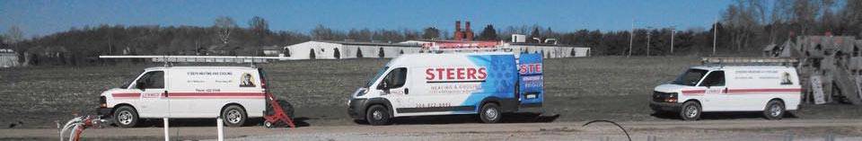 Steers work vans on driveway